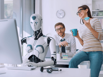Empleados en una oficina trabajando con un robot